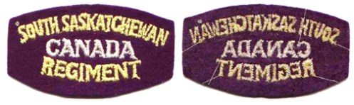 British made embroidered melton, starch back title, showing the characteristic stitching and glue or sized backing. Raymond Gilbert