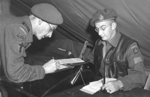 Supervisors of the YMCA (left) and Knights of Columbus Catholic Army Huts (right)