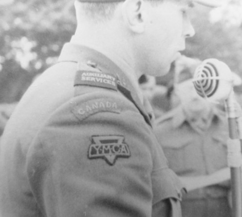 An officer of the YMCA Auxiliary Services wearing Service Dress, May 1943. Photo Library and Archives Canada.