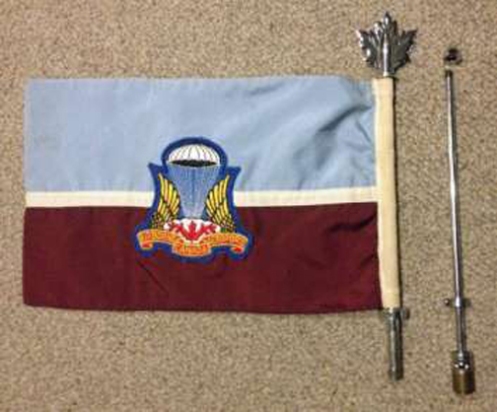 Two styles of staves are shown here along with a Canadian Airborne Regiment pennant. (Author's collection)