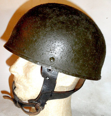 An example of a Canadian-made steel DR helmet converted to an airborne helmet. It has been painted Paint, Exterior, Flat Green No 3-213. Author’s collection