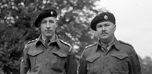 Two GGFG officers. As Officers did not wear collar badges in Service Dress, and the GGFG had no authorized beret badge at this time, the officer on the left has taken a Senior NCO's collar badge into use.