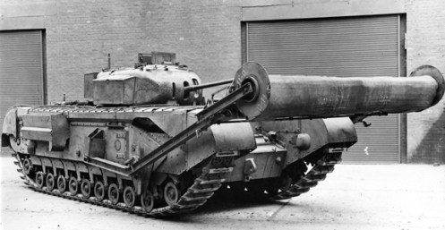 As mentioned in the text, the use of the “Beach Track Laying Device” at Dieppe, led to the development and production of various forms of mat layers to assist the passage of both wheeled and armoured vehicles over soft ground. The Bobbin Mk I and Bobbin Mk II, were two types of these mat layers that were developed. This photo shows a Bobbin Mk I, which carried a 9-foot 11-inch wide canvas mat on a spindle supported by short movable arms above the front horns of the tank, fitted to the front of a reworked Churchill Mk II tank. Source: Authors’ collection.