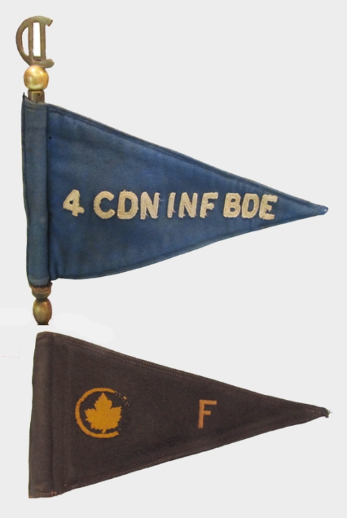 Brigadier J. E. Sager’s pennants. The top example was used when he commanded the  4th Canadian Infantry Brigade. This pennant has been adapted to a desk ornament and exhibits a locally-produced staff featuring the C/2 symbol of the 2nd Canadian Infantry Division.  The lower pennant was used when he commanded “F” Reinforcement Group. Courtesy Royal Westminster Regiment Museum