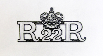 This drawing, from the Royal Warrant, shows the badge worn since 1958 and still in wear today.