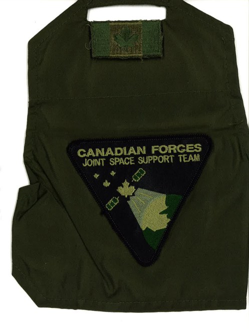 The brassard worn with the subdued badge by team members when on Ops and in CadPat. When the team switched to flight suits the badge was changed to a pattern with Velcro backing. Author's collection
