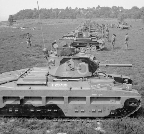 In the foreground is a Mark IIA* Matilda III Close Support, armed with the 3-inch howitzer (with the co-axial 7.92-millimetre Besa machine gun mounted on it’s right). Although this particular tank (T29795) did not serve with the Canadian Army Overseas, the Mark IIA* Matilda III Close Support tanks that were issued to the Calgary, and Three Rivers Regiments, respectively, would have appeared as such. Source: IWM (H 11654).