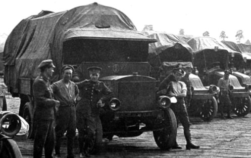 Note the "C-Two" identification plate, shown here above the cowl on the nearest truck, and attached to the cab roof on the others, MilArt photo archives