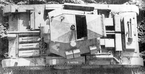 An overhead view of a Covenanter I, in British service, bearing British War Department number T18703, which was built under Contract number T.7219, by English Electric Valve Co., showing the driver’s hatch in the closed position, and the turret full-width top hatch, in the open position. The three small external stowage bins, on the left-side of the turret, each held two 100 round drums of .303-inch ammunition, for the anti-aircraft/ground defence, .303-inch Bren light machine gun. The long bin on the right-side of the turret, was for the stowage of the .303-inch Bren light machine gun, when not in use. The marking on the front left-side of the turret, is that of the British Royal Armoured Corps Gunnery School, which was located at Lulworth Camp, Dorset. Source: authors’ collection.