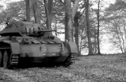 Another view of T18368, while taking part in the filming of  ‘Ten Tips for Tackling Tanks.’ The ‘F2,’ in the centre of the nose plate, directly below the headlamp, indicates, that this tank is the number two tank of the ‘Fighting Group’ (commonly referred to as the ‘Fighting Troop’) of the brigade headquarters, with the other three tanks bearing the markings ‘F1,’ ‘F3,’ and ‘F4,’ respectively. To the left of the ‘F2’ marking, can be seen the Arm of Service marking (‘171’) of the brigade headquarters, as explained earlier. The marking that appears above left, of the Arm of Service marking, is that of the Formation sign (by which the formation that the unit operating the vehicle belonged to, was identified), used by the 1st Canadian Army Tank Brigade, from mid August 1941 to mid October 1942, which consisted of a gold or yellow maple leaf centred on an eight-inch by ten-inch square black background, with a black left-facing image of a ram superimposed centrally on the maple leaf. Source: authors’ collection.