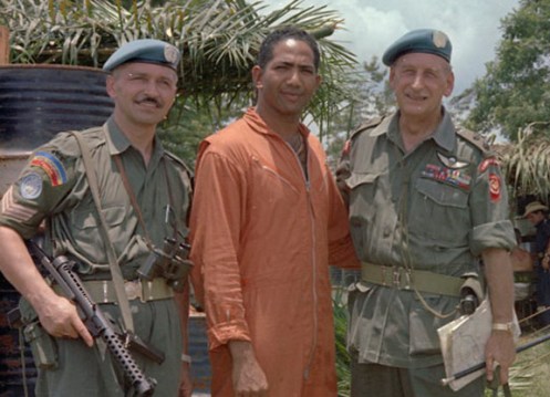 This series of photographs are from the Canadian Army official photos of the Congo mission. Taken shortly after the action for which Mayer was awarded the George Cross he is shown with the helicopter pilot (top) and the R22eR Sergeant who accompanied him. The other photos show UN officers involved in the planning and the helicopter that transported the mission members. MilArt photo archives, 