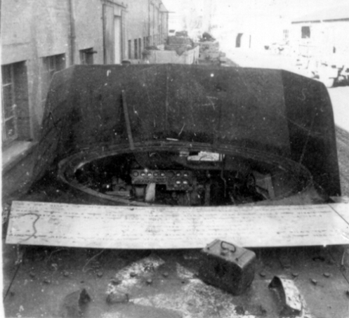 A mock-up of the proposed two-foot (one-metre) high shield, which fit around the forward edge of the circular opening in the Ram Kangaroo hull top, that was devised by No. 2 Canadian Tank Troops Workshop, Royal Canadian Electrical and Mechanical Engineers, and was inspected by the regiment’s second-in-command, Major Bingham, on 27 October 1944, but was never adopted. MilArt photo archives