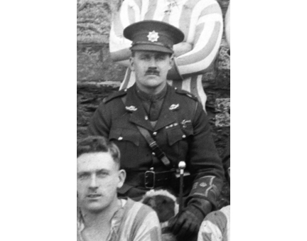 Major H.T. Cock of The RCR holding a round knob pattern swagger stick. Photo courtesy of Michael O'Leary.