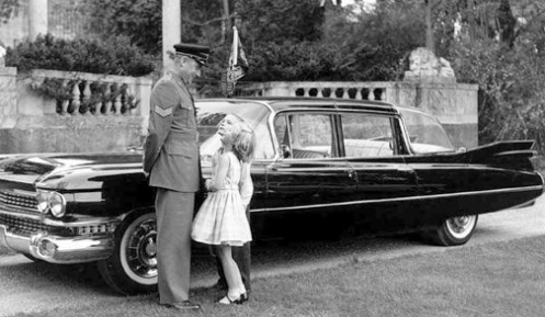 The driver drawing special interest from this young lady.